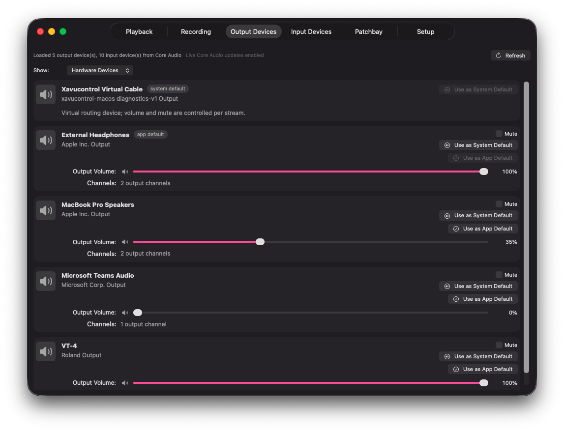Output Devices tab with device volume and default controls.